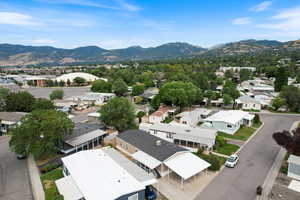Aerial view of residential area with a mountain backdrop