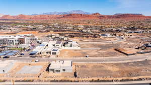 Aerial view of residential area with a mountain backdrop