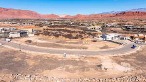 Aerial view of residential area with a mountainous background