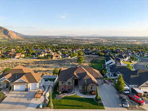 Aerial view of residential area featuring a mountain backdrop