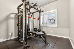 Exercise room featuring baseboards