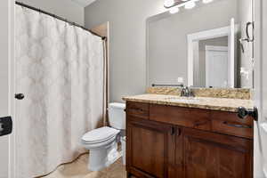 Bathroom featuring vanity and tile patterned floors