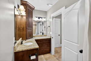 Bathroom featuring vanity