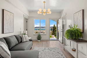Living room with a chandelier and wood finished floors