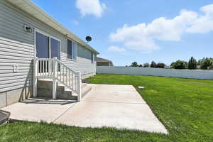 View of yard with a patio