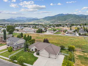 Aerial view of residential area featuring a mountain backdrop