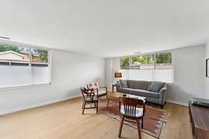 Living room with light real hardwood floors.