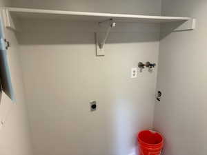 Laundry area with hookup for an electric dryer and hookup for a washing machine