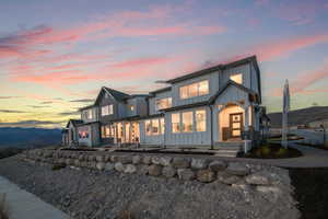 Back of house at dusk with board and batten siding