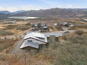 View of property location featuring a water and mountain view