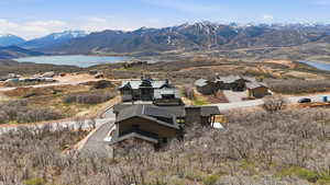 View of mountain backdrop featuring a nearby body of water
