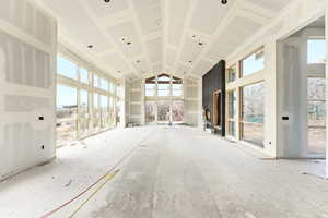 Great Room featuring high vaulted ceiling