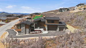 Aerial perspective of suburban area with a mountain backdrop