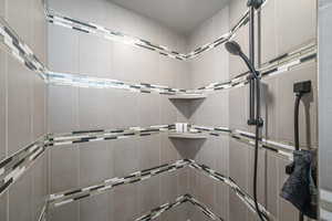 Bathroom with tiled shower