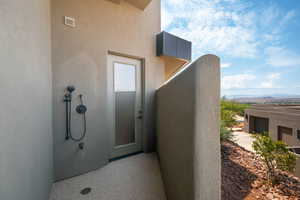 View of home's exterior featuring stucco siding and a mountain view