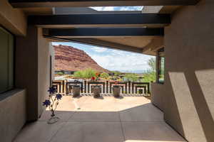 Patio / terrace with a mountain view