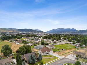 Aerial view of residential area with a mountain backdrop
