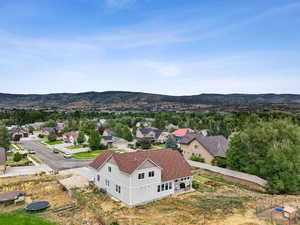 Aerial perspective of suburban area featuring mountains