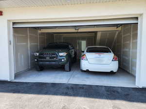 Garage featuring driveway