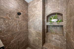 Bathroom with tiled shower