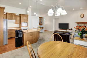 Dining space with a chandelier.