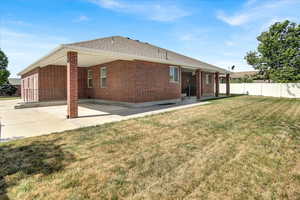 Back of house with yard.