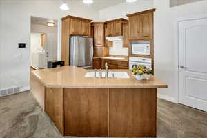 Kitchen featuring silestone quartz countertop.