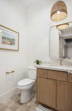 Bathroom with vanity and toilet