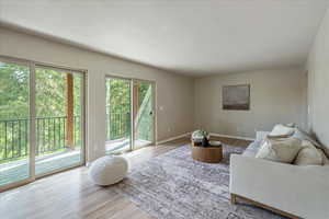 Living room with wood finished floors and baseboards