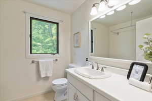 Primary Full bathroom with vanity, tile patterned floors, and a shower