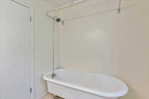 Primary Bathroom with a freestanding claw foot tub