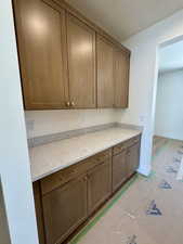 Kitchen featuring baseboards