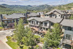 Aerial view of residential area with a mountain backdrop