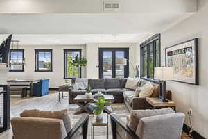 Living room featuring light wood finished floors and baseboards