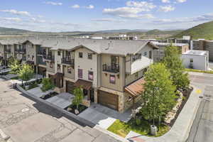 Aerial view of residential area with a mountainous background