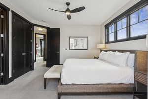Bedroom with carpet flooring and a ceiling fan