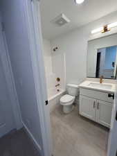 Main Bathroom w/ painted cabinets, quartz countertops and upgraded faucets and hardware (this is throughout home)!