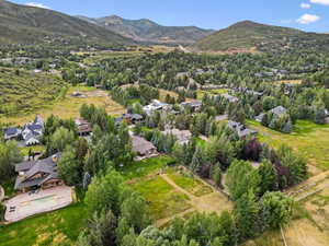Aerial overview of property's location with a mountain backdrop