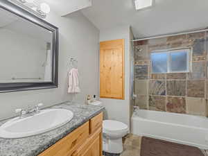 Full bathroom with vanity and tub / shower combination