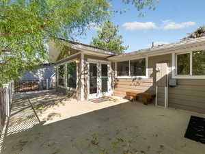 Rear view of house with a patio