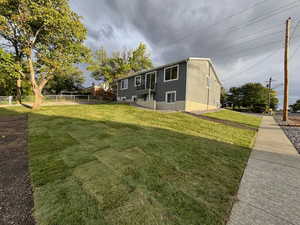 Rear view of property featuring stucco siding