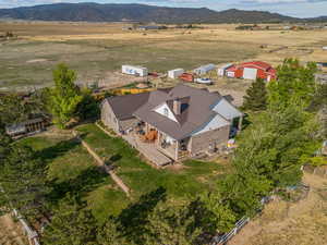 Overview of rural landscape with a mountain backdrop