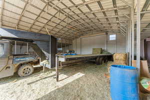 Misc room featuring lofted ceiling