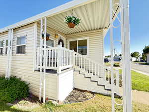 Entrance to property with covered porch.