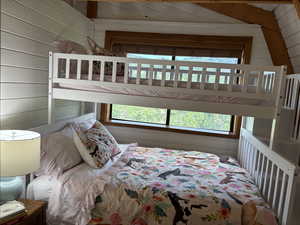 Bedroom featuring large east facing window