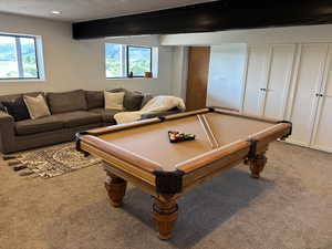 Recreation room with carpet floors, billiards table, and recessed lighting