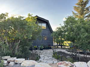 Stone patio walkway to front door