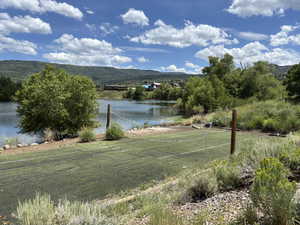 Jones Lake community park with volleyball and picnic area