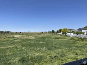 View of yard with a view of rural / pastoral area