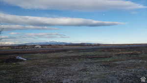 View of yard featuring a mountain view and a rural view